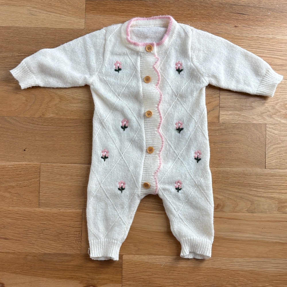 Cozy White and Pink Knit Baby Onesie